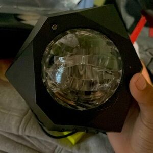 It’s a light up it glows in the dark and it come with a cable and a box it chang